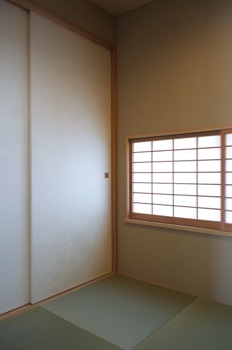 Japanese room with screen closed.   Japanese room with screen closed.